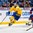 BUFFALO, NEW YORK - JANUARY 4: Sweden's Rasmus Dahlin #8 retrieves the puck ahead of USA's Kieffer Bellows #23 during the semi-final round of the 2018 IIHF World Junior Championship. (Photo by Andrea Cardin/HHOF-IIHF Images)

